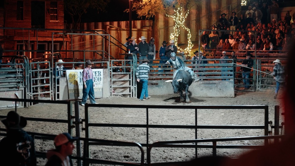A bull rider in the arena at a Cave Creek saloon